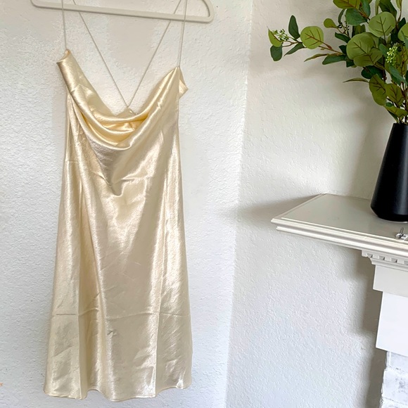 Double Zero Dresses & Skirts - Cream colored silky dress with draped front.